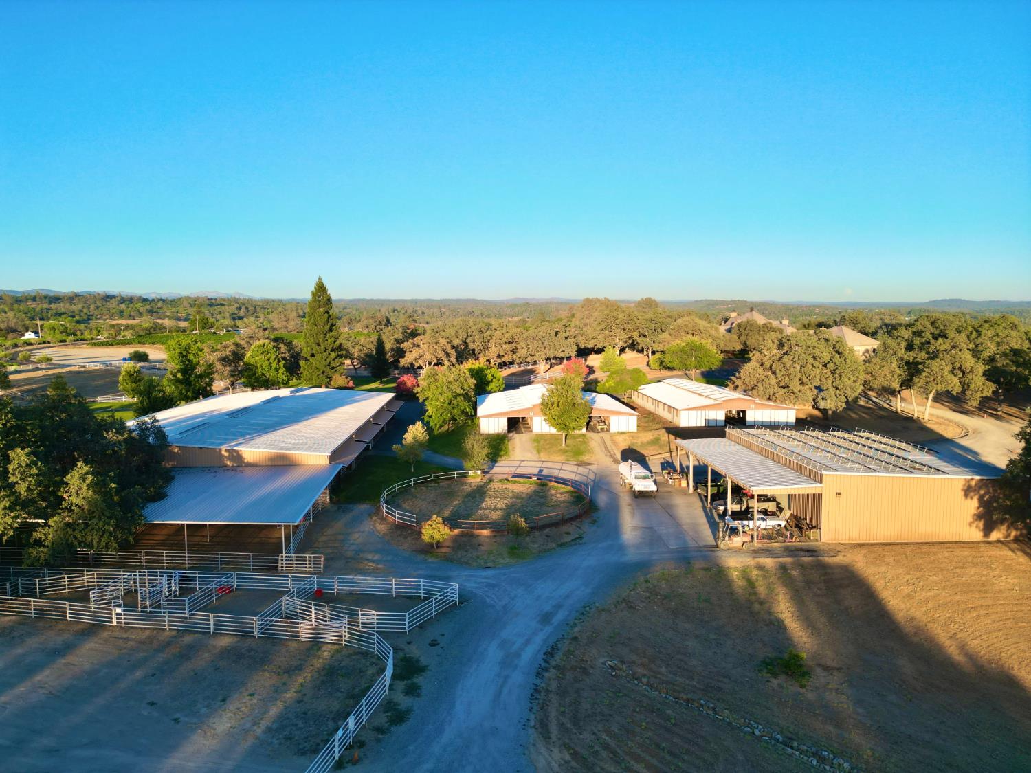 1100 Cold Springs Road Placerville, CA 95667 - Photo 74 of 97 Expansive rural property featuring multiple barns, a covered arena, outdoor arena and round pen