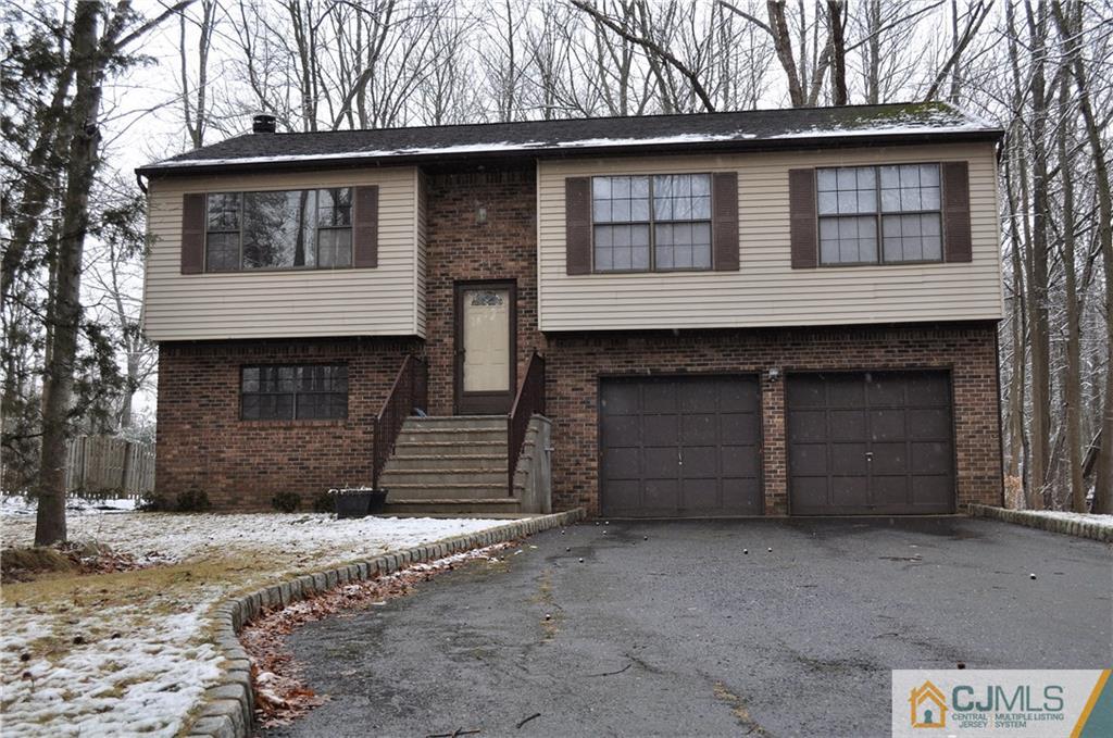 449 Cottrell Road Old Bridge, NJ 08857 - Photo 2 of 17 a front view of a house with a yard