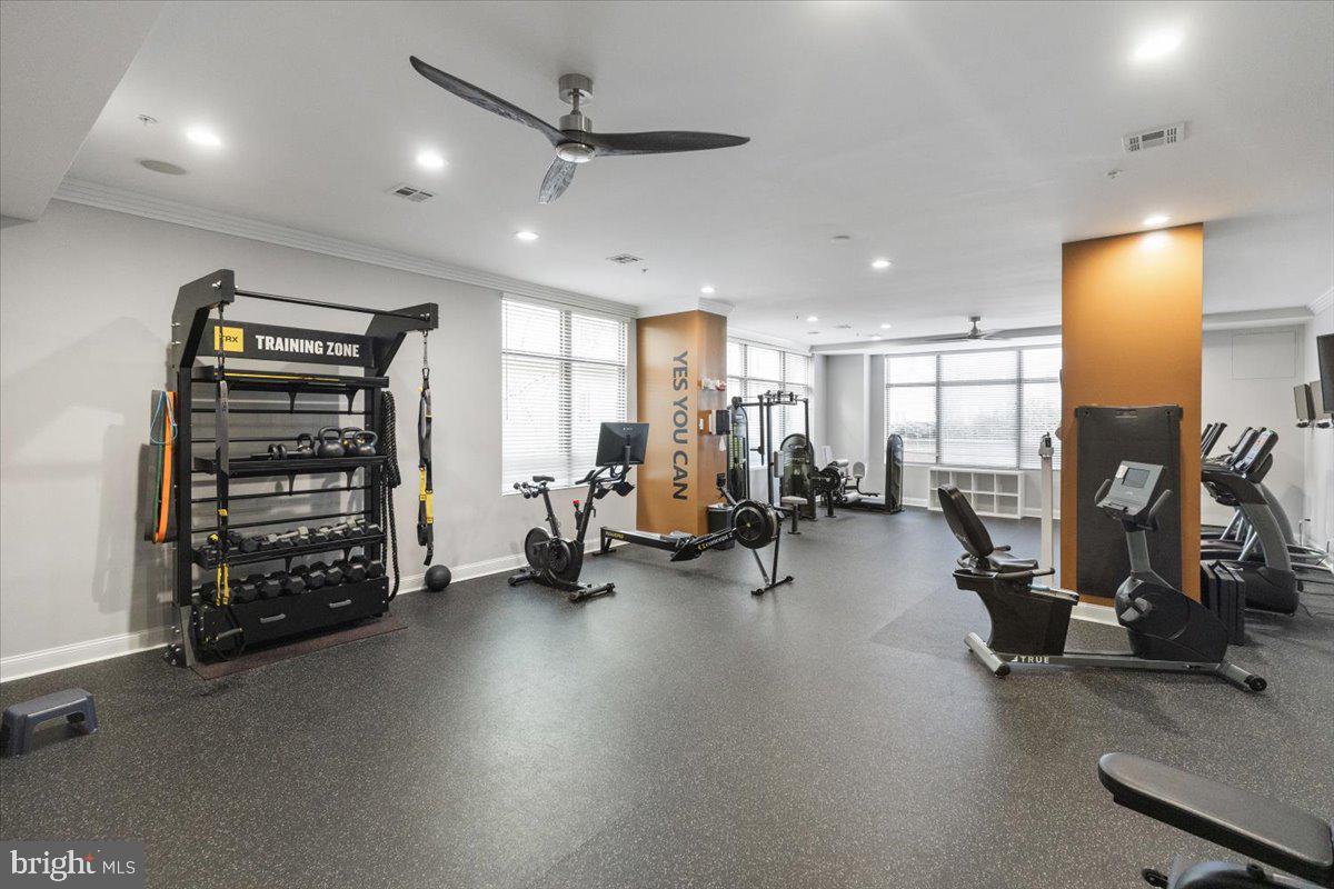 12001 Market Street, Unit 257 Reston, VA 20190 - Photo 28 of 33 a view of a room with gym equipment