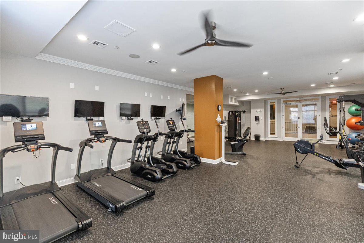 12001 Market Street, Unit 257 Reston, VA 20190 - Photo 29 of 33 a view of a room with gym equipment