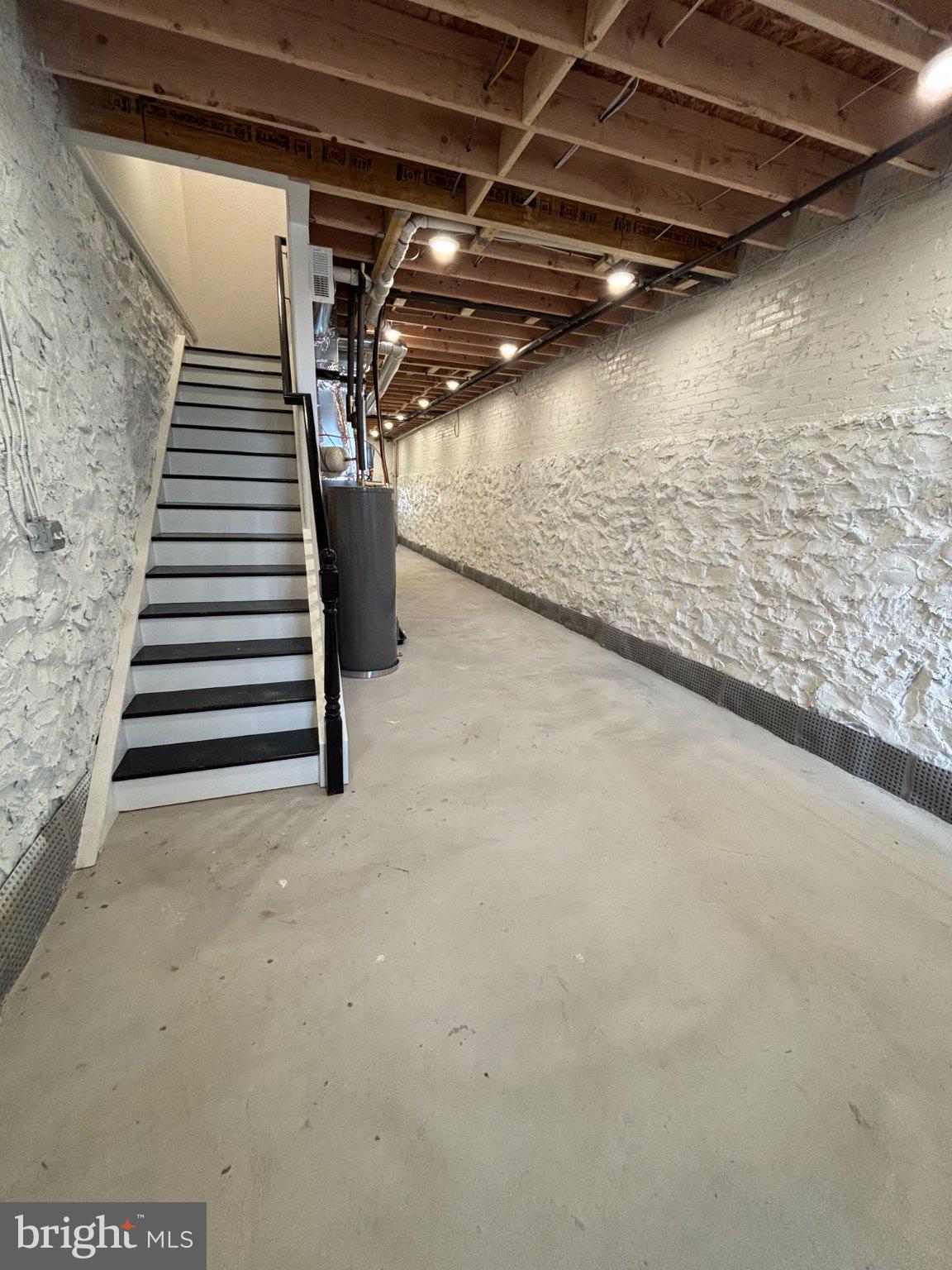 4818 Pimlico Road Baltimore, MD 21215 - Photo 12 of 18 a view of a room with stairs