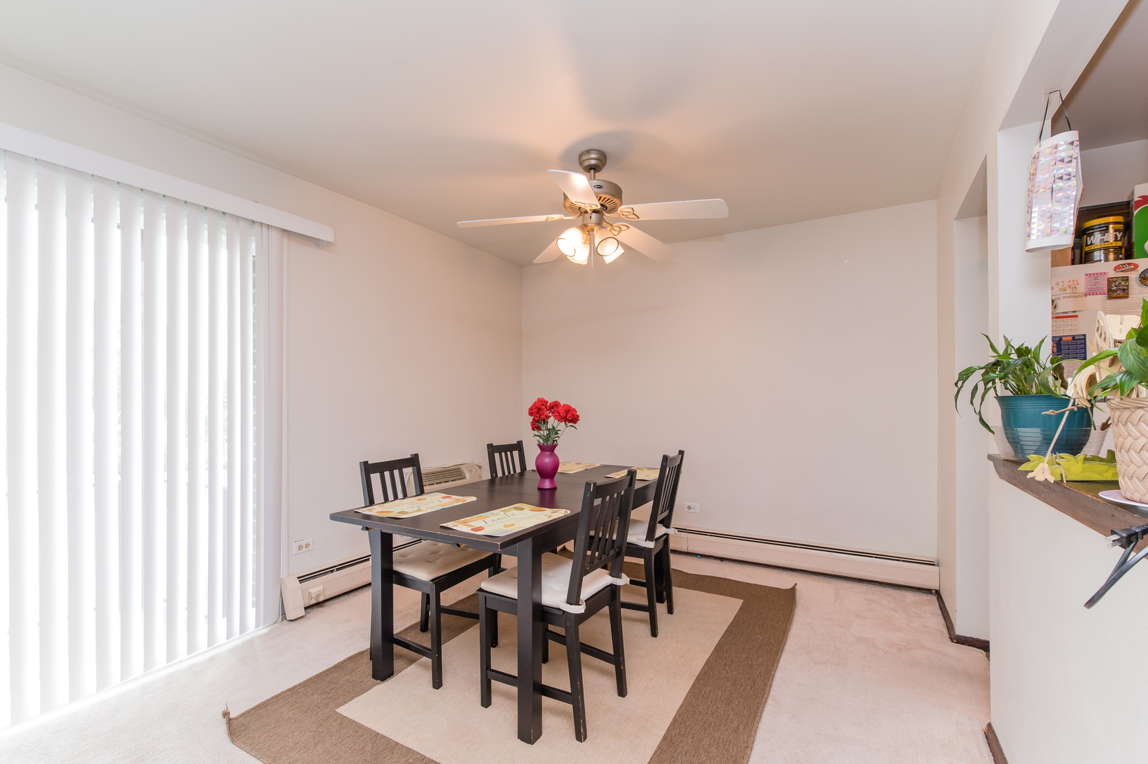 765 Terrace Court, Unit 206 Elgin, IL 60120 - Photo 14 of 31 a view of a dining room with furniture and a window