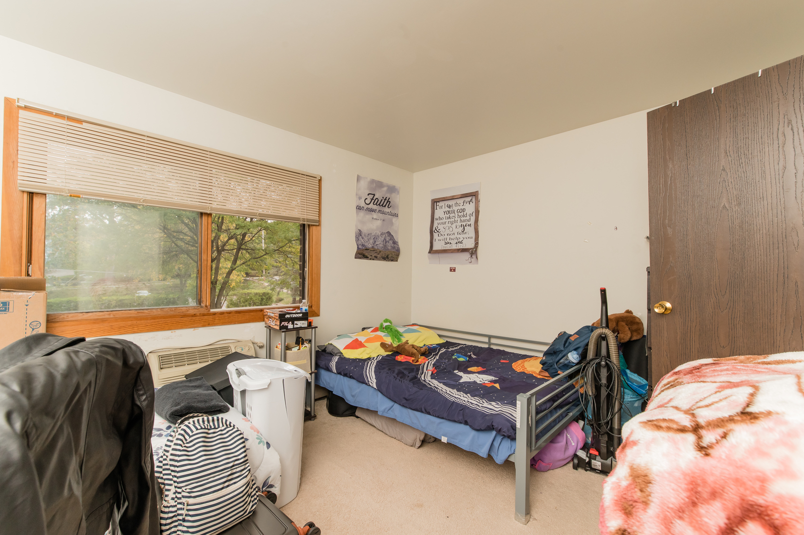 765 Terrace Court, Unit 206 Elgin, IL 60120 - Photo 16 of 31 a bedroom with a bed and wooden floor