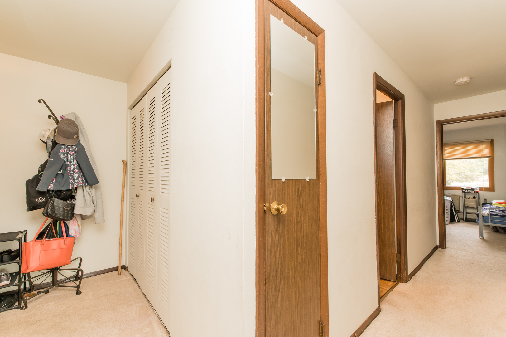 765 Terrace Court, Unit 206 Elgin, IL 60120 - Photo 10 of 31 a view of a hallway with bathroom