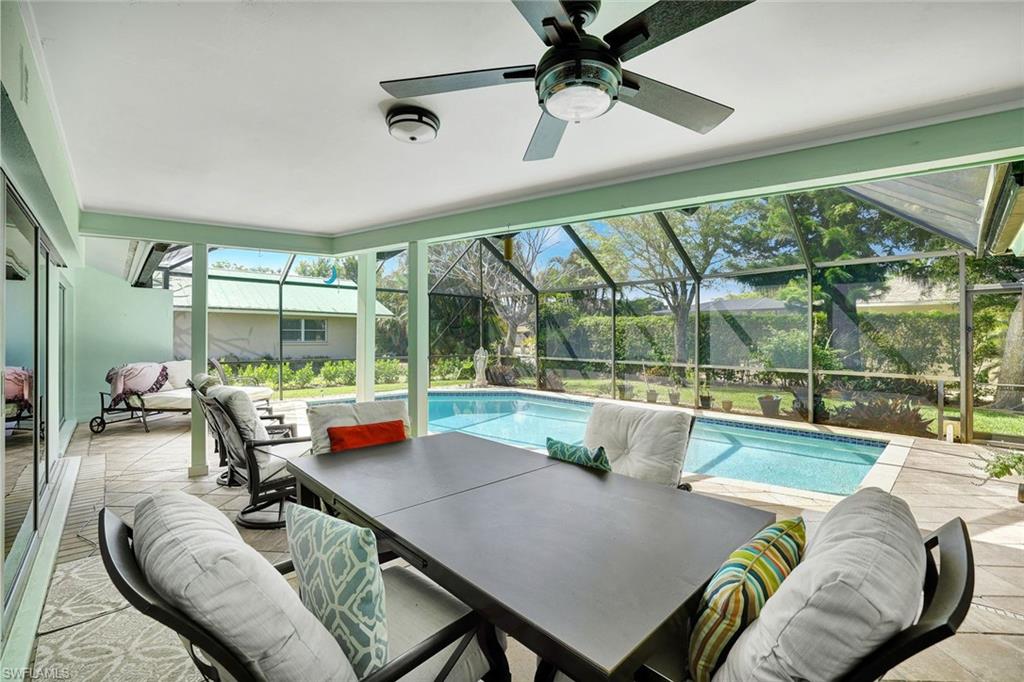 208 Baltusrol Drive Naples, FL 34113 - Photo 18 of 25 Dining area on lanai