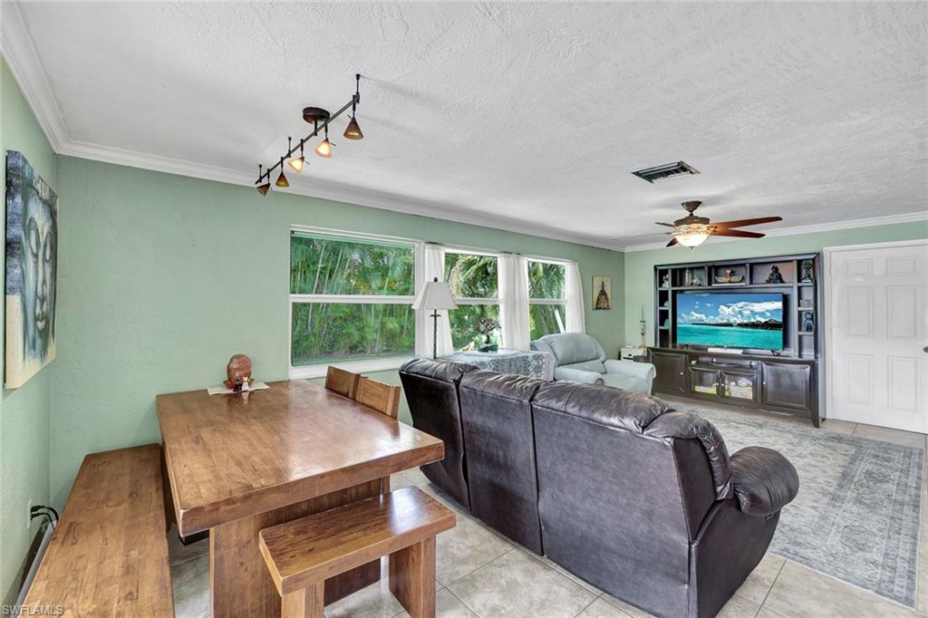 208 Baltusrol Drive Naples, FL 34113 - Photo 6 of 25 Eat in area off den