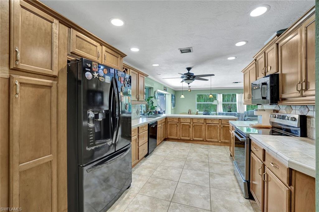 208 Baltusrol Drive Naples, FL 34113 - Photo 7 of 25