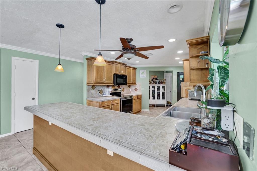 208 Baltusrol Drive Naples, FL 34113 - Photo 9 of 25 Kitchen