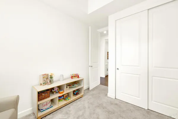 a view of utility room and bathroom