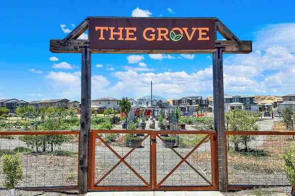 an aerial view of a city with lawn chairs