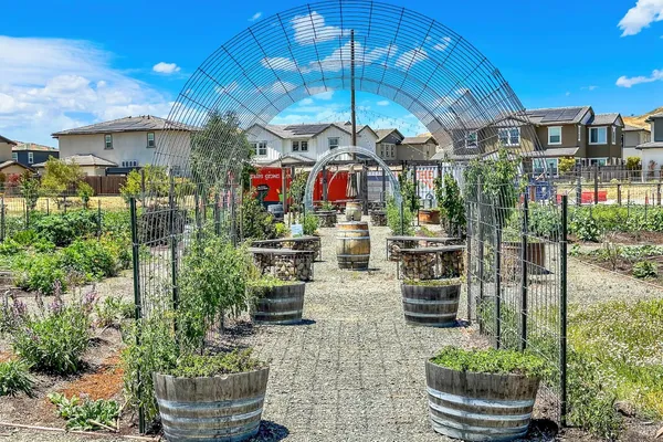an aerial view of a house with garden space and outdoor space