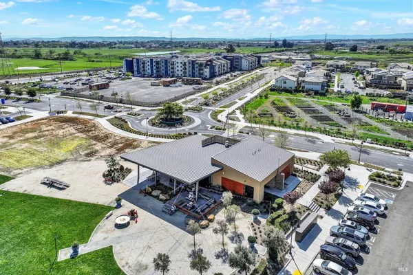an aerial view of a house with a lake view