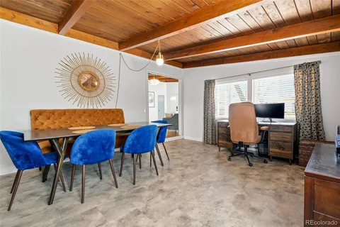 a workspace with furniture and window