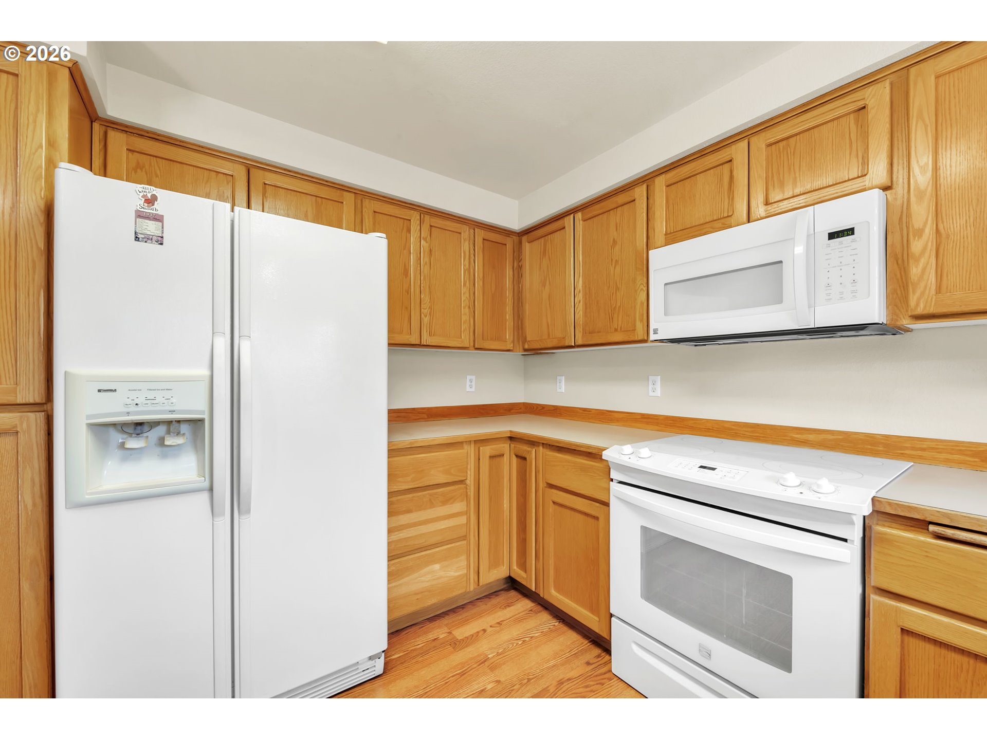 4471 Spring Meadow Avenue Eugene, OR 97404 - Photo 12 of 31 a kitchen with a refrigerator sink and cabinets
