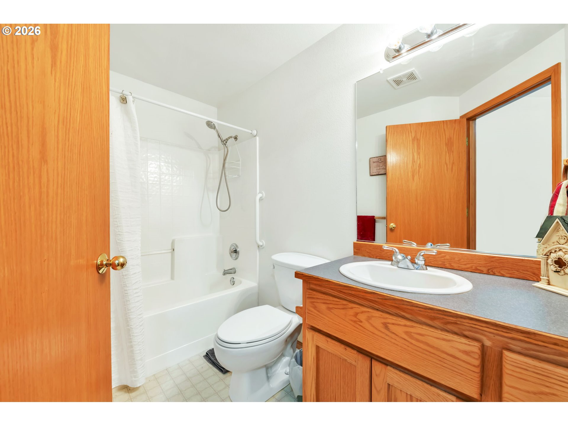 4471 Spring Meadow Avenue Eugene, OR 97404 - Photo 23 of 31 a bathroom with a sink a toilet and shower