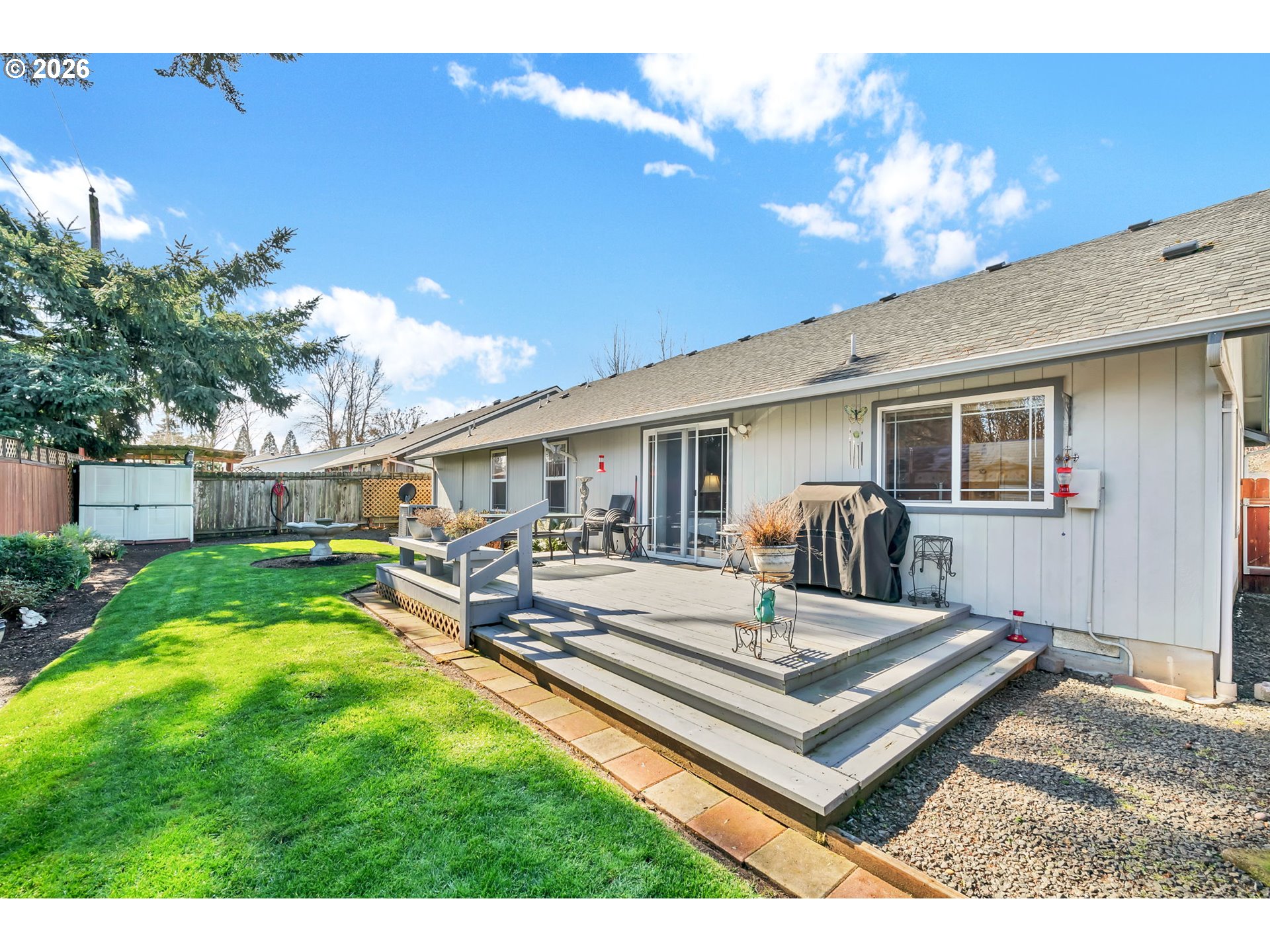 4471 Spring Meadow Avenue Eugene, OR 97404 - Photo 26 of 31 a view of a house with backyard and sitting area