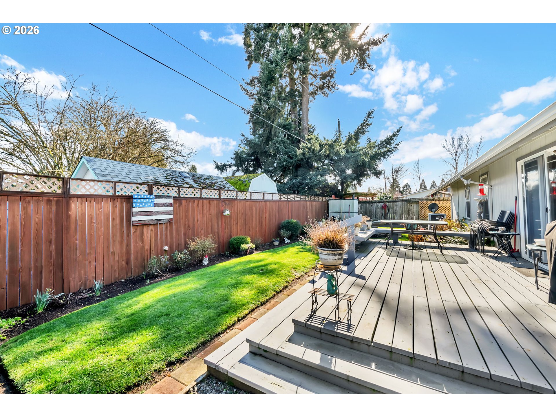 4471 Spring Meadow Avenue Eugene, OR 97404 - Photo 28 of 31 a view of a backyard with sitting area