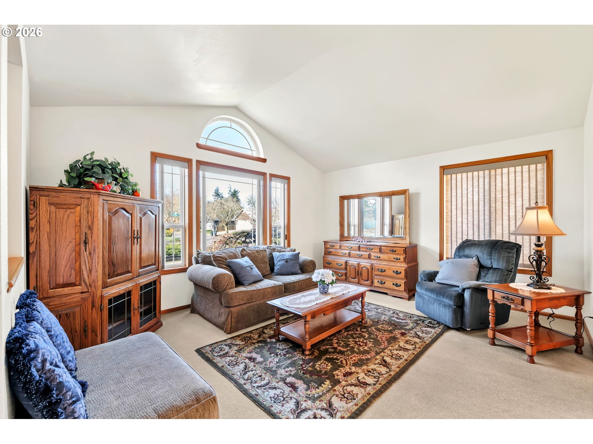 4471 Spring Meadow Avenue Eugene, OR 97404 - Photo 3 of 31 a living room with furniture flat screen tv and a window