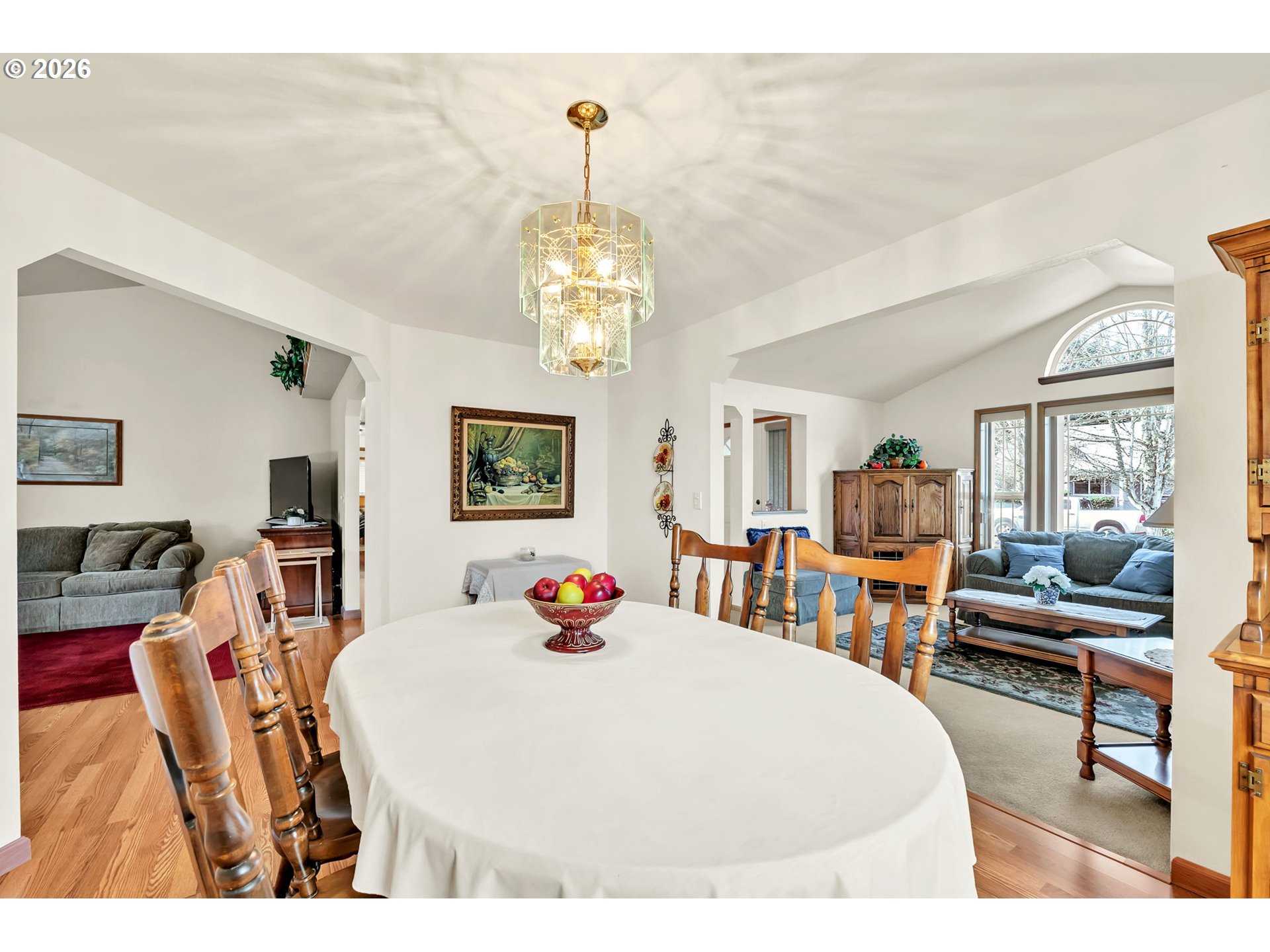 4471 Spring Meadow Avenue Eugene, OR 97404 - Photo 5 of 31 a living room with furniture and a chandelier