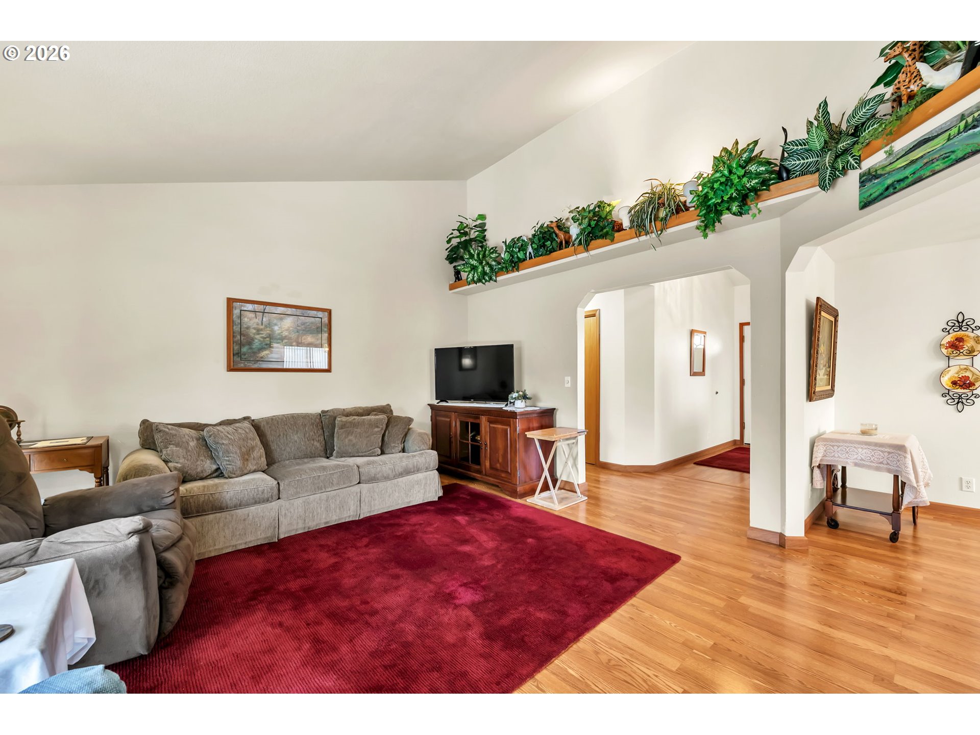 4471 Spring Meadow Avenue Eugene, OR 97404 - Photo 6 of 31 a living room with furniture and a flat screen tv
