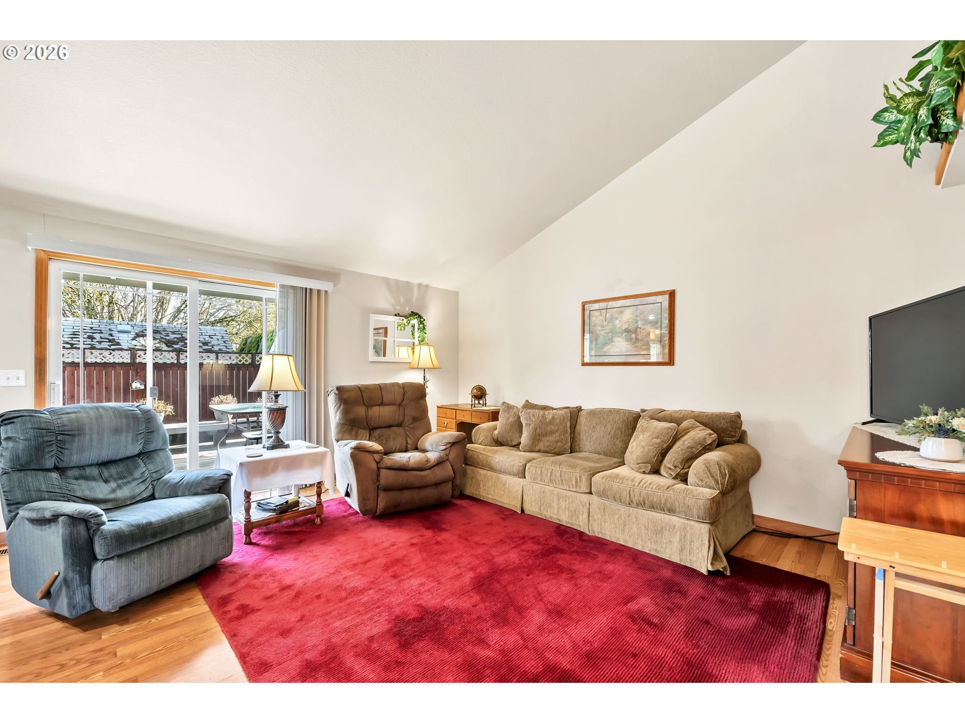 4471 Spring Meadow Avenue Eugene, OR 97404 - Photo 7 of 31 a living room with furniture and a flat screen tv