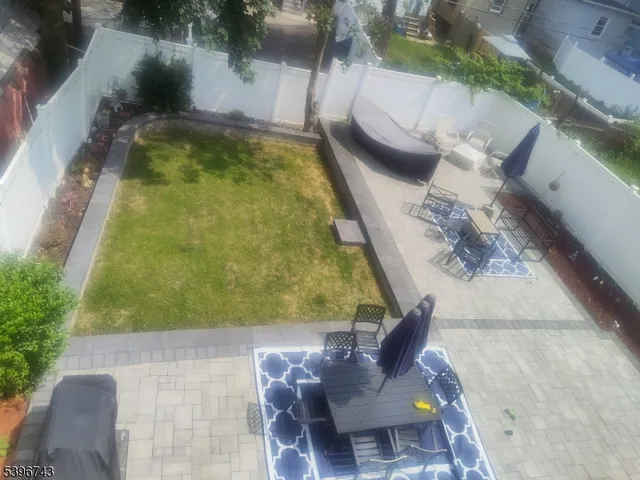 view of a swimming pool with outdoor seating