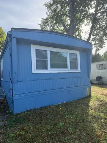 a view of a backyard with a garden