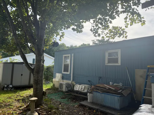 a backyard of a house with lots of green space