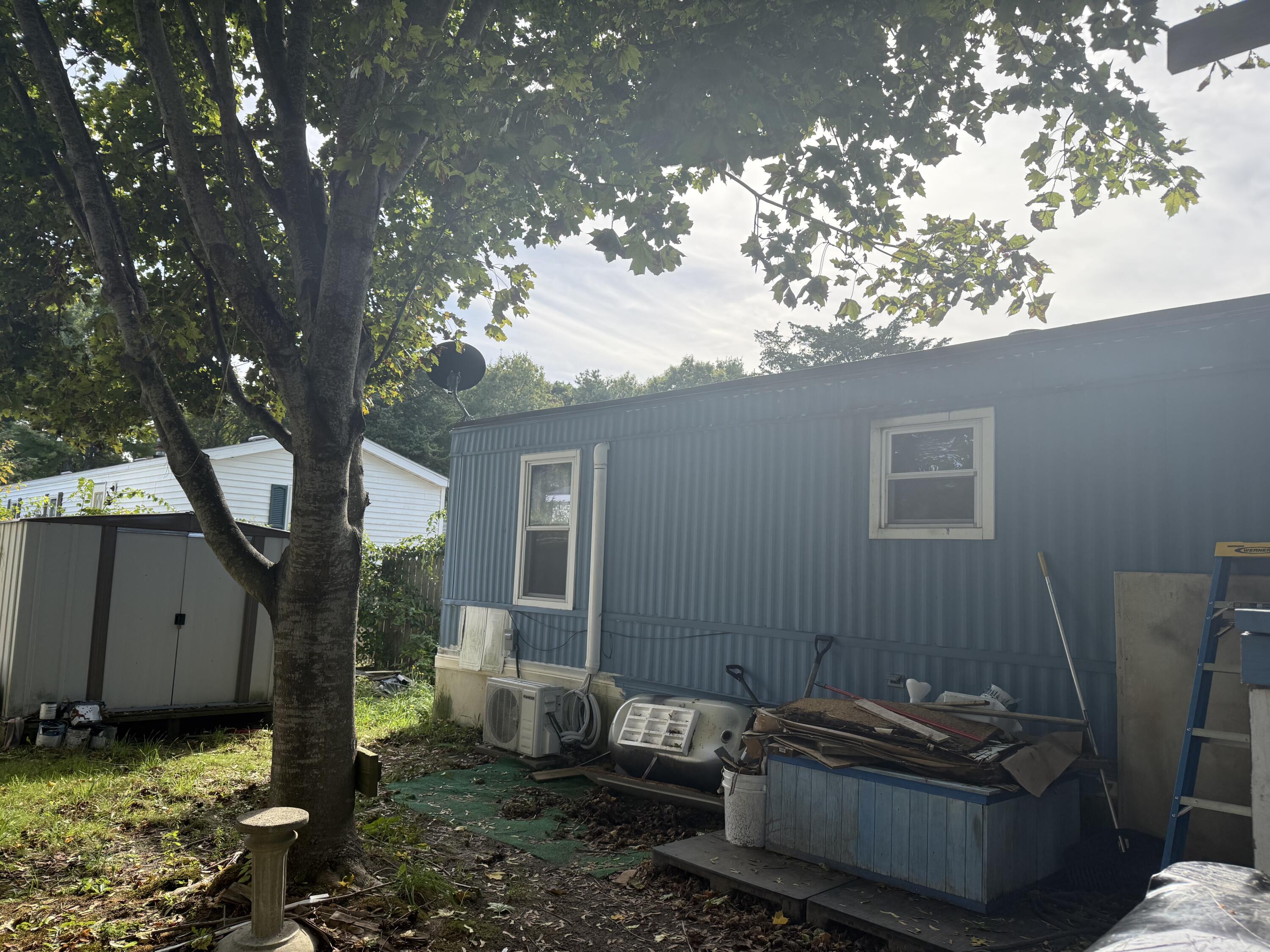 7 4th Avenue Pocasset, MA 02559 - Photo 4 of 9 a backyard of a house with lots of green space