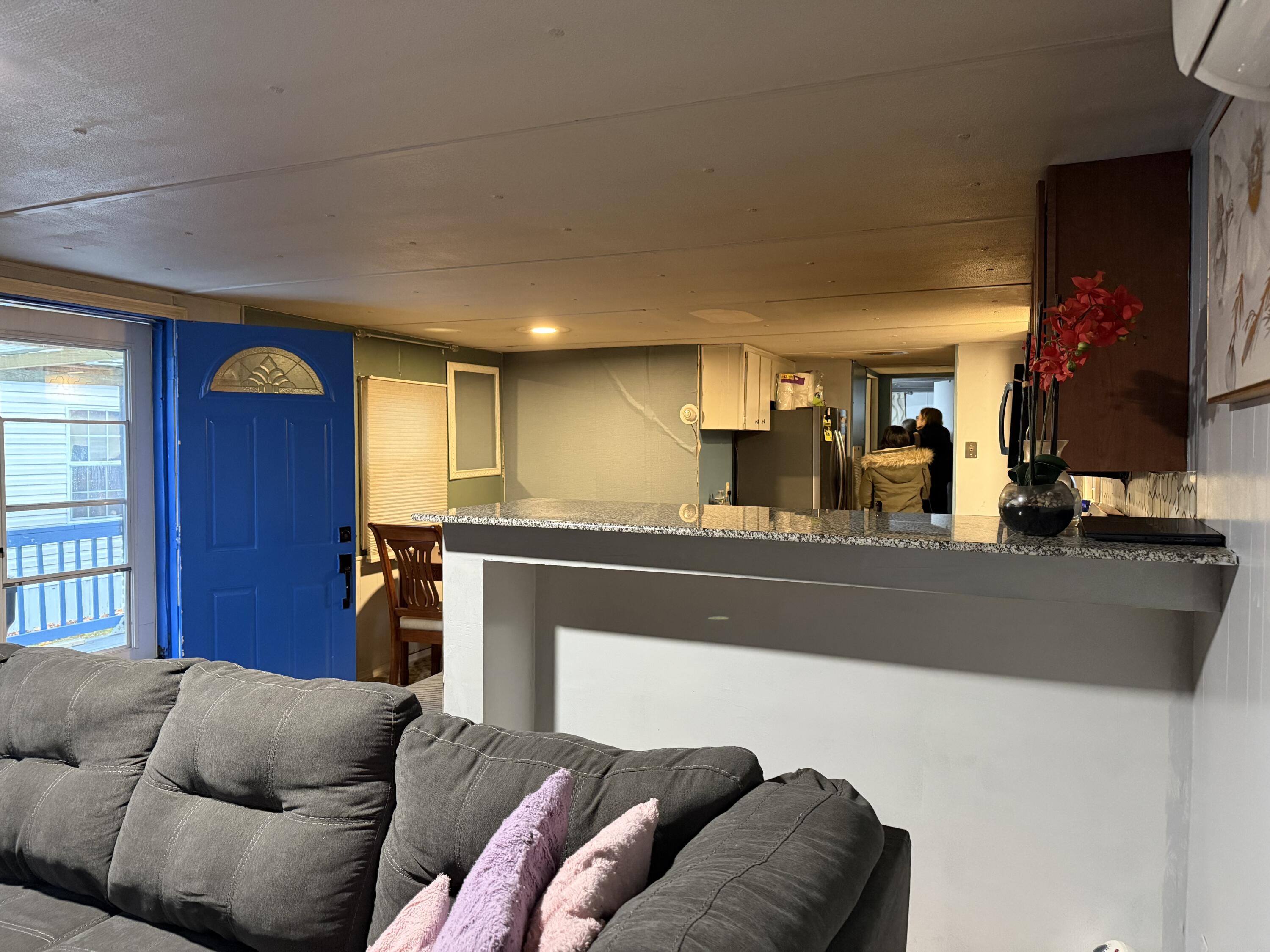 7 4th Avenue Pocasset, MA 02559 - Photo 6 of 9 a living room with furniture and a flat screen tv