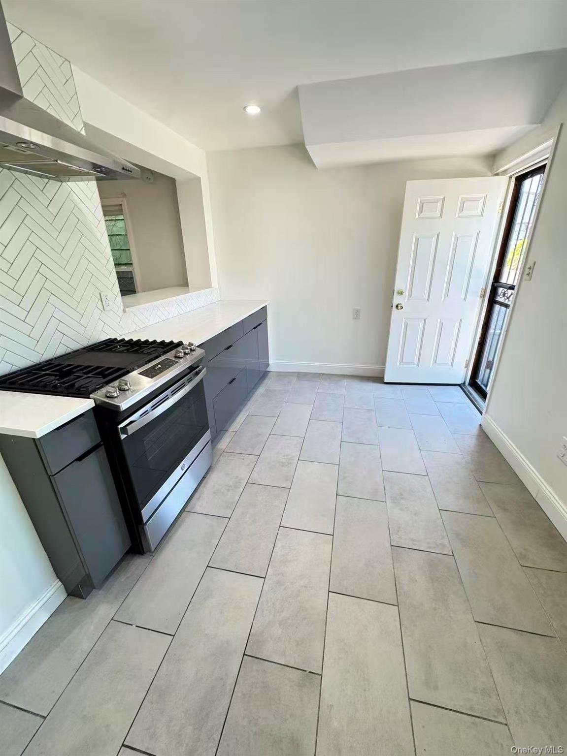 89-36 90th Street Queens, NY 11421 - Photo 3 of 11