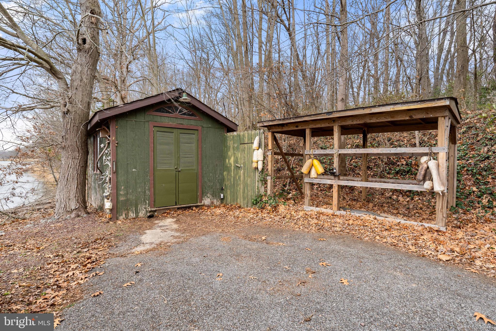 37 Cattail Lane Elkton, MD 21921 - Photo 21 of 42 a view of a house with a large tree and wooden fence