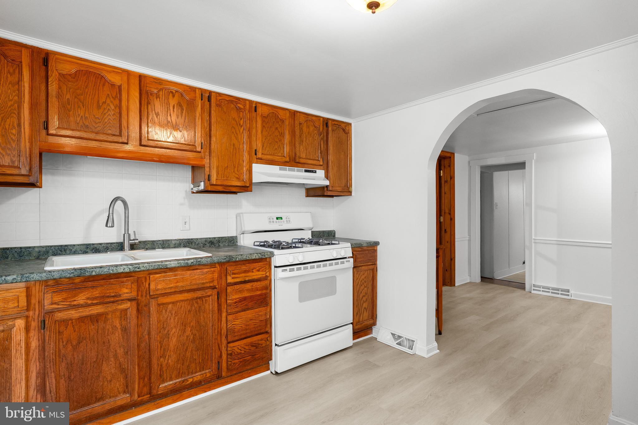 37 Cattail Lane Elkton, MD 21921 - Photo 24 of 42 a kitchen with stainless steel appliances granite countertop a sink a stove and cabinets