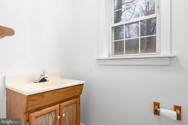 a view of room with window and bathroom