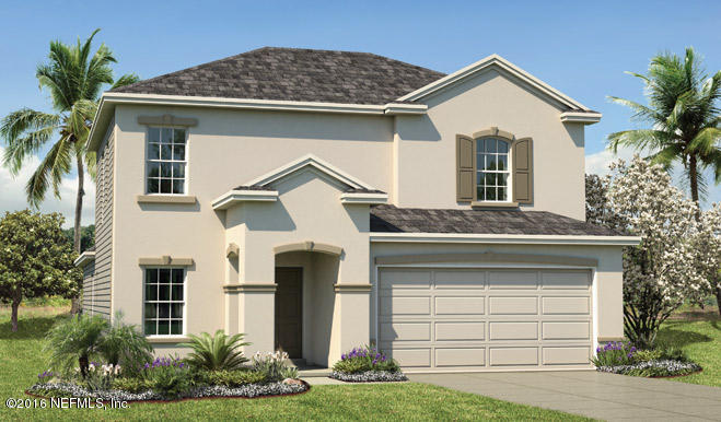 6745 Azalea Park Road Jacksonville, FL 32259 - Photo 1 of 1 a front view of a house with a yard and garage