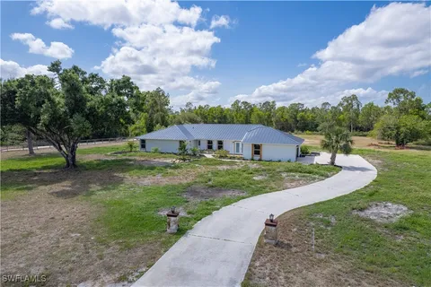 a view of street with houses
