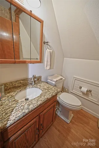 a view of a workspace with furniture and a couch