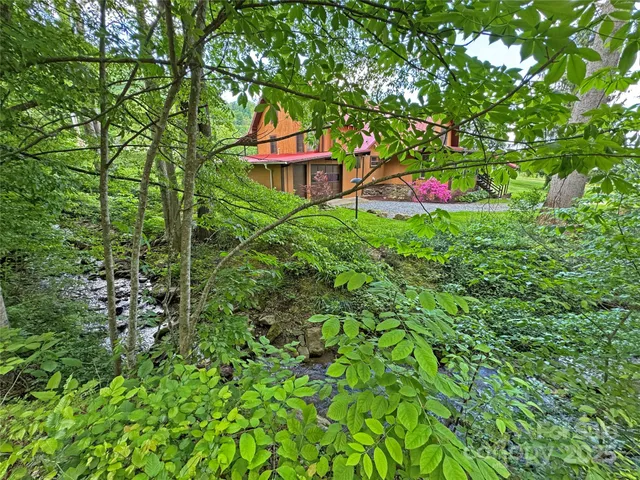 a view of a golf course with a lake