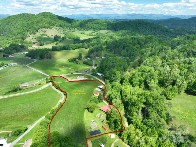 a view of a chairs and table in patio