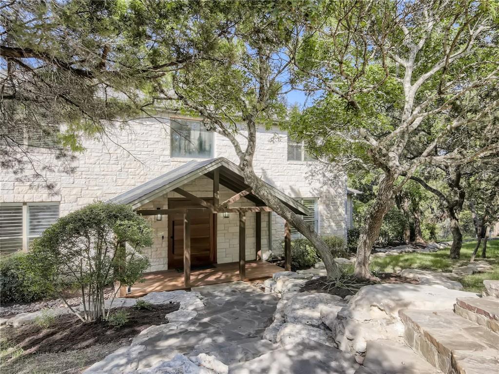 267 North Commons Ford Road Austin, TX 78733 - Photo 3 of 34 View of front of property featuring stone siding