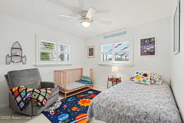 a bedroom with furniture and a couch