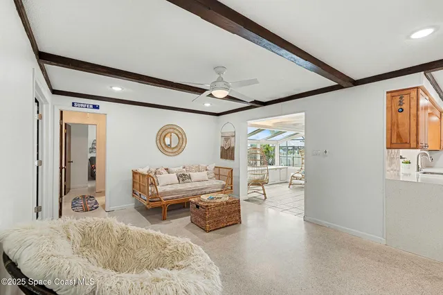 a kitchen with granite countertop a refrigerator and a sink