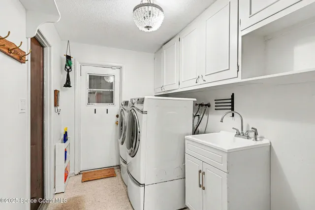 a view of door with wooden floor