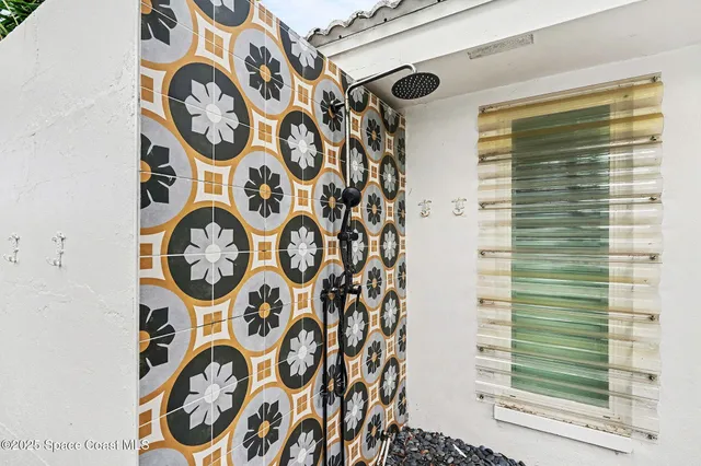 a view of a swimming pool with a lounge chairs