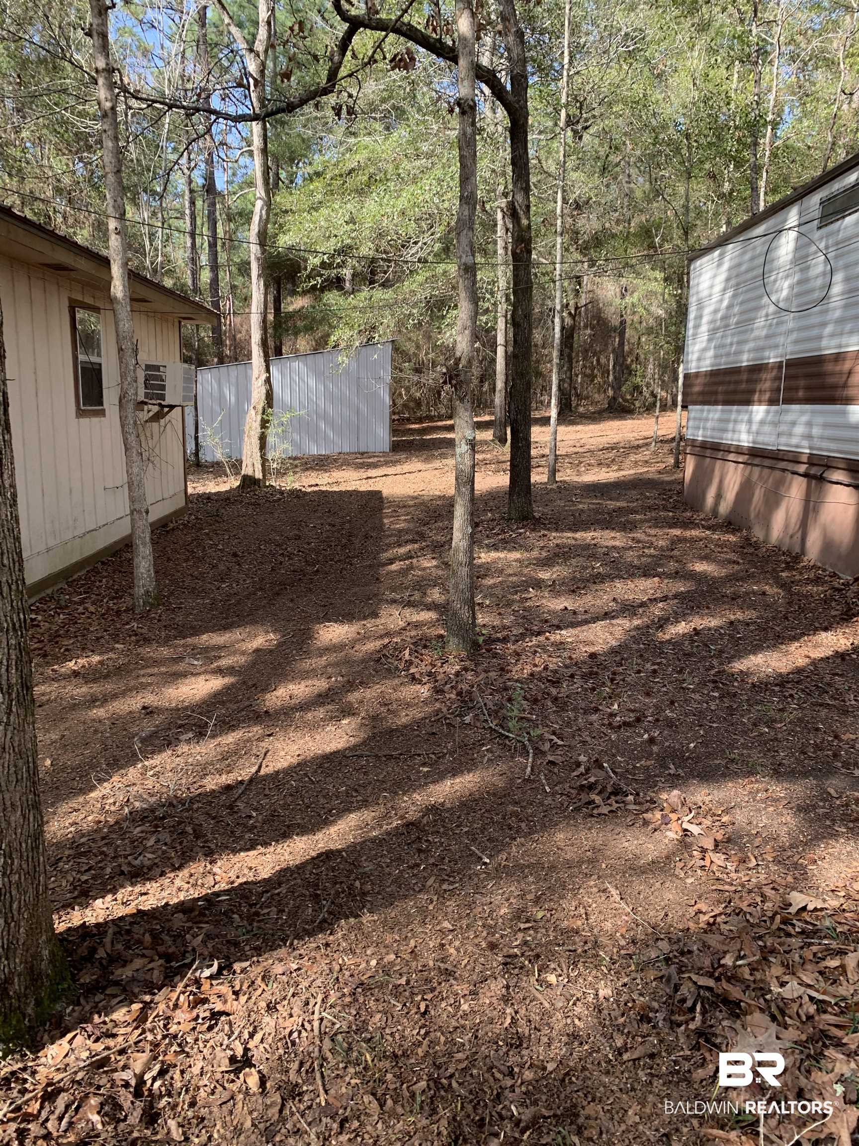 15575 Rogers Drive Chunchula, AL 36521 - Photo 5 of 42 View of yard featuring fence