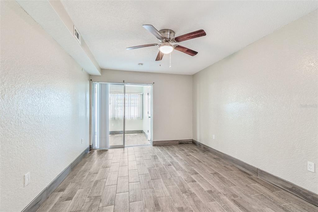5111 Amulet Drive, Unit 104 New Port Richey, FL 34652 - Photo 32 of 74 a view of an empty room and window