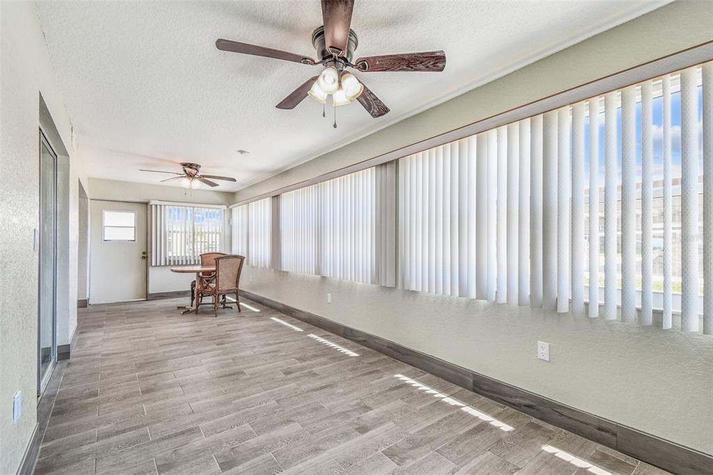 5111 Amulet Drive, Unit 104 New Port Richey, FL 34652 - Photo 41 of 74 a view of an empty room with a window