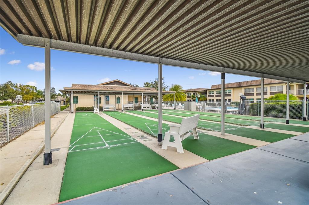 5111 Amulet Drive, Unit 104 New Port Richey, FL 34652 - Photo 61 of 74 a view of outdoor space yard deck and patio