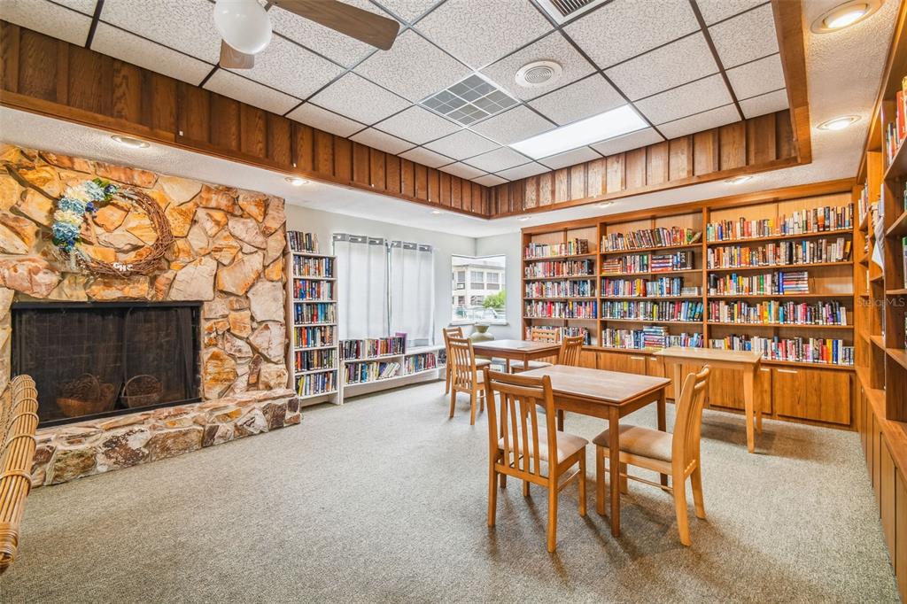 5111 Amulet Drive, Unit 104 New Port Richey, FL 34652 - Photo 64 of 74 a dining room with furniture and a rug