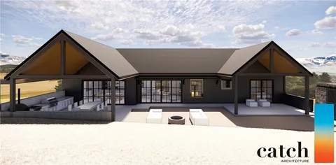 a view of a house with a bed and wooden floor